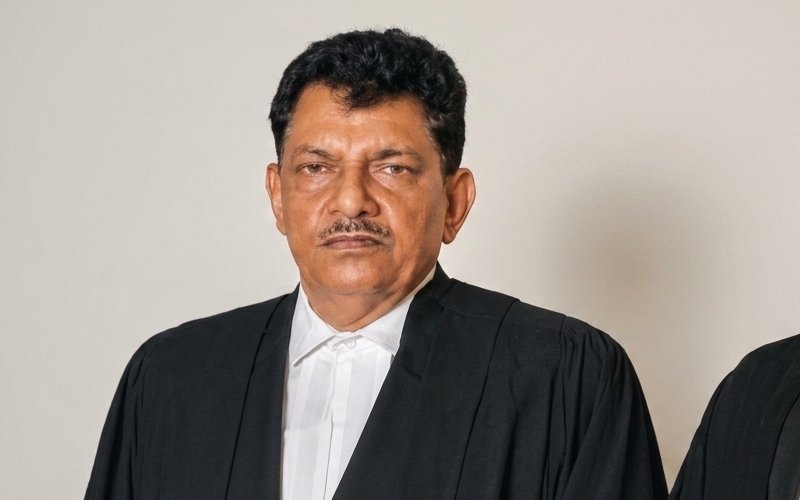 Adv Bimlesh Kumar Jain, B.A. LL.B., advocate at Civil Law Firm, Kolkata, in advocate's robes